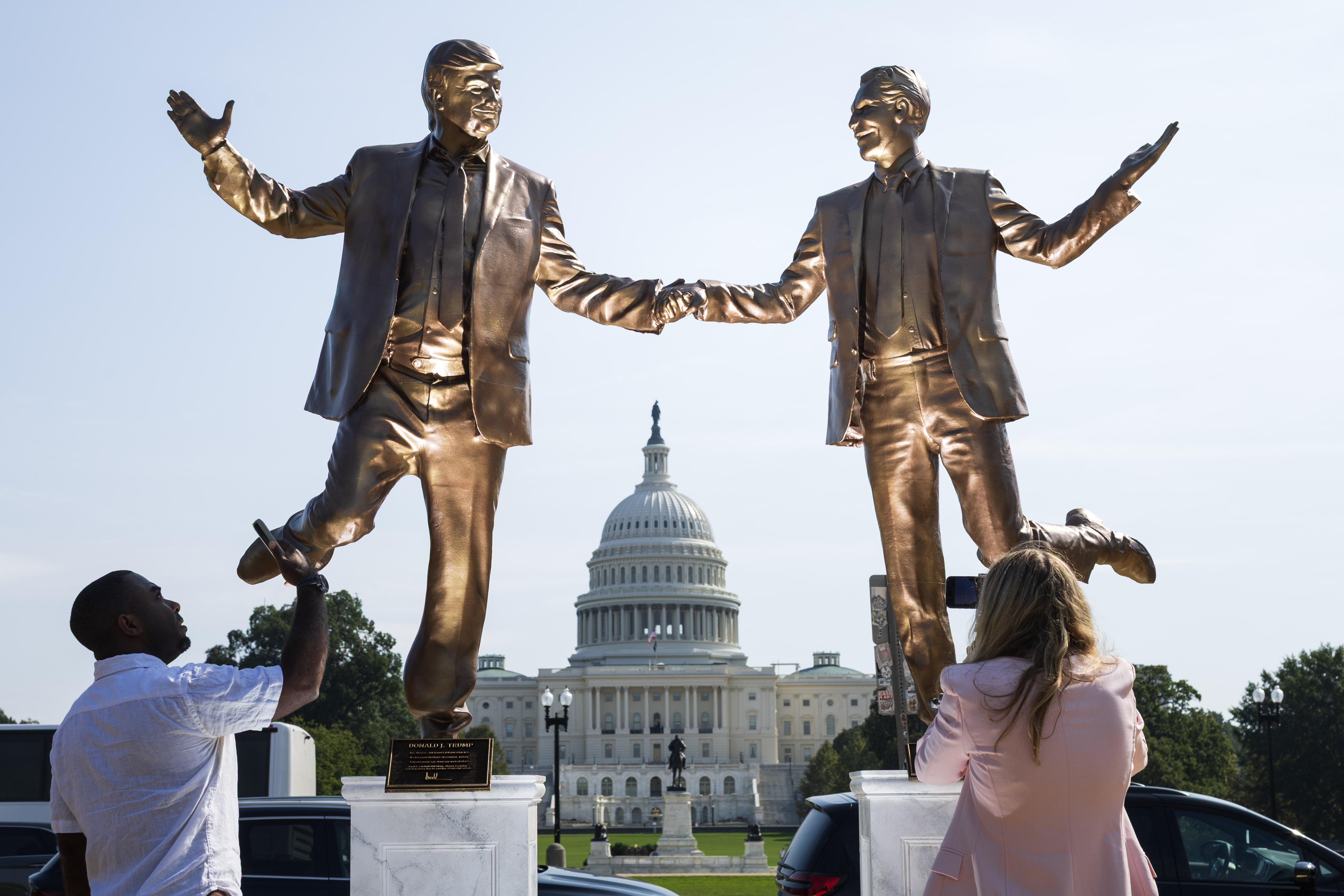 Statue of Trump and Epstein holding hands placed on National Mall - The  Washington Post