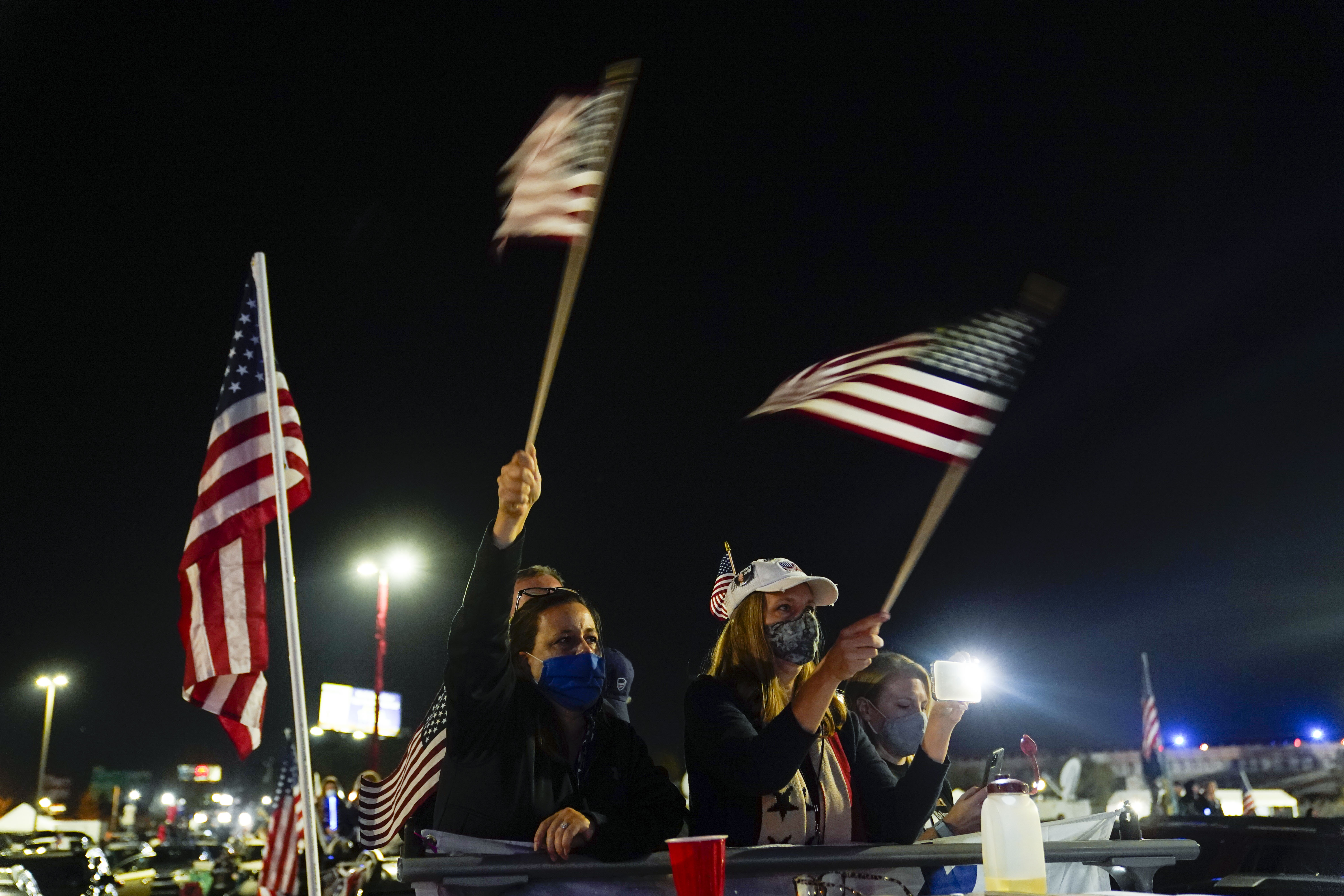 Democrats Supporting Joe Biden Broke Out American Flags In Celebration Of Trump S Defeat The Washington Post