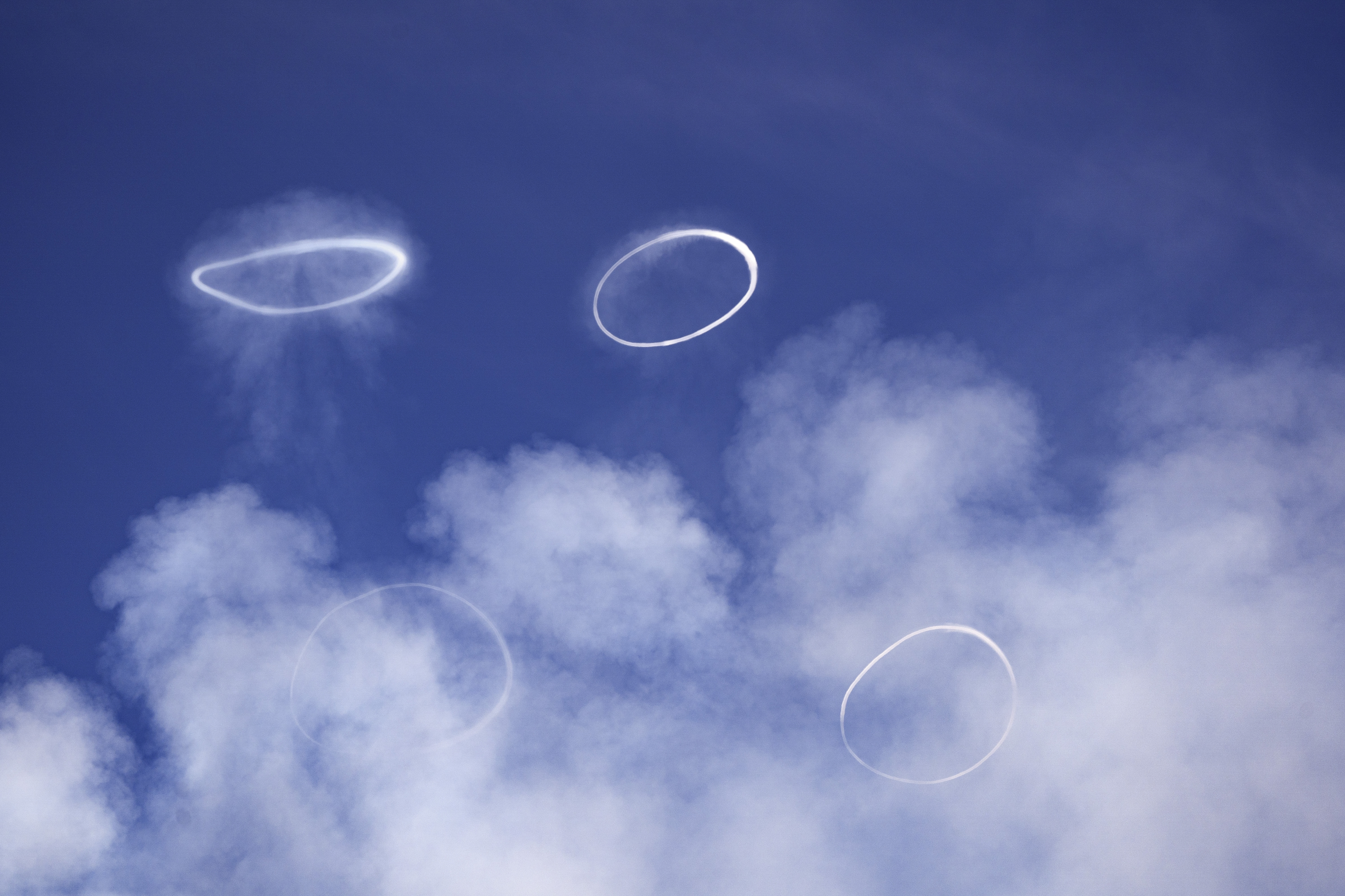 Mount Etna volcano puffs giant rings of gas, photos and videos show ...