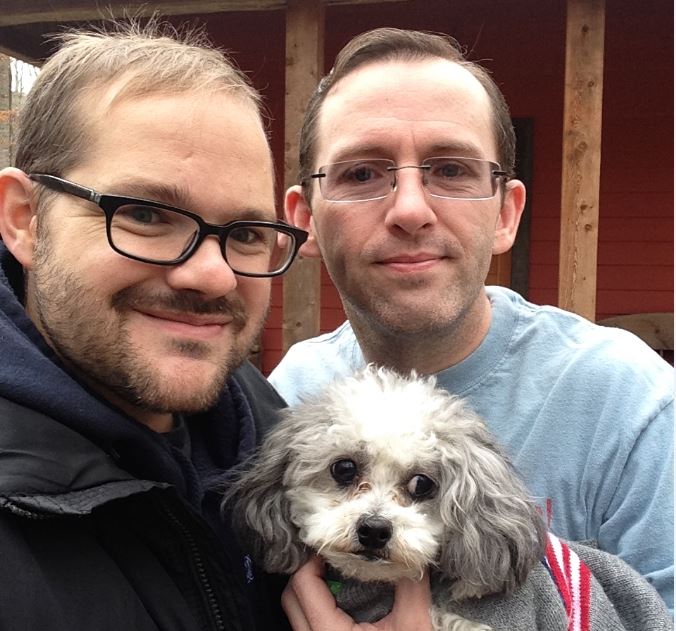 man talking to dog about bacon