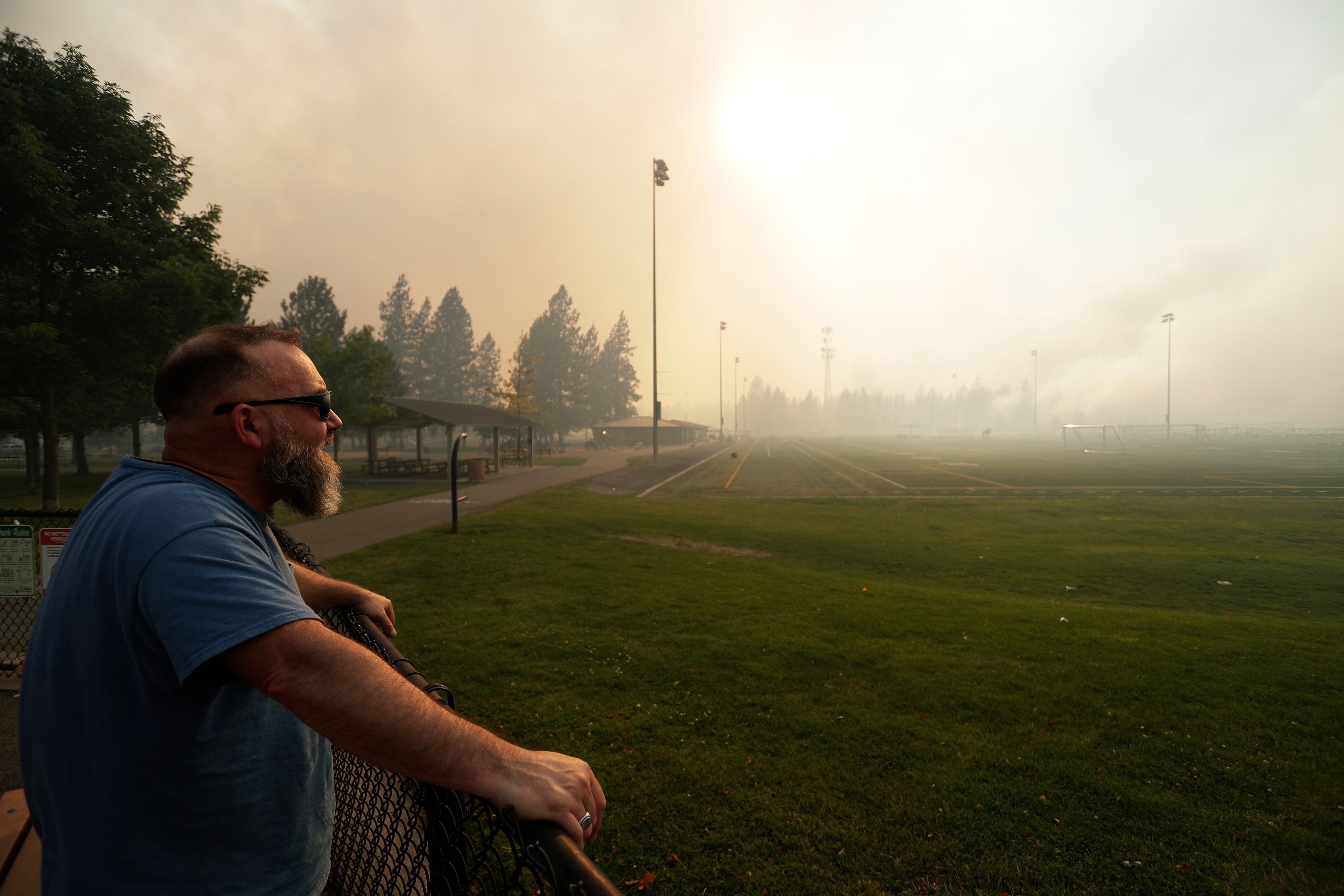 Fast-moving wildfires in Washington state prompt mass evacuations in Spokane County; residents flee their homes as blazes spread