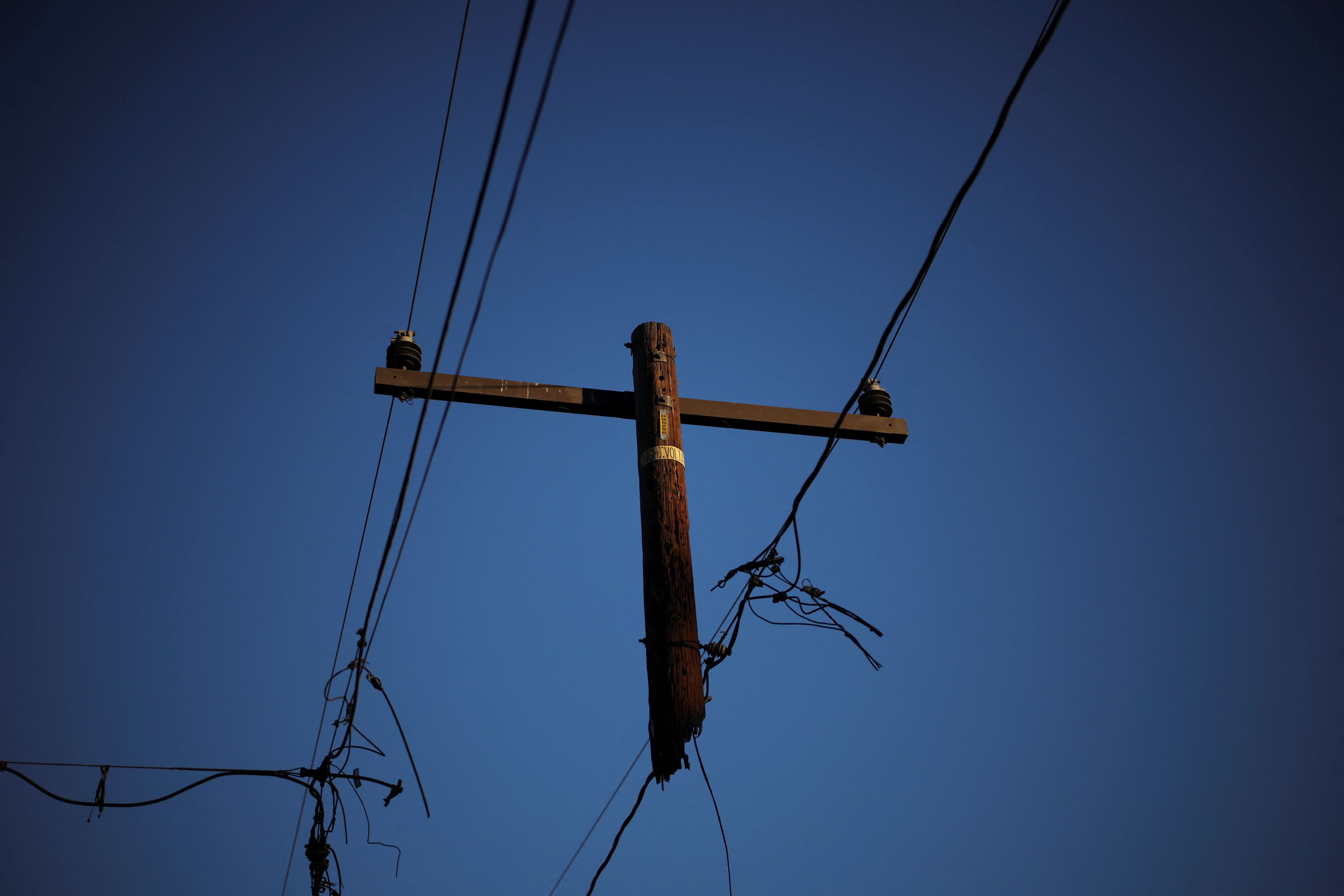How wildfires are imperiling the utilities charged with sparking 