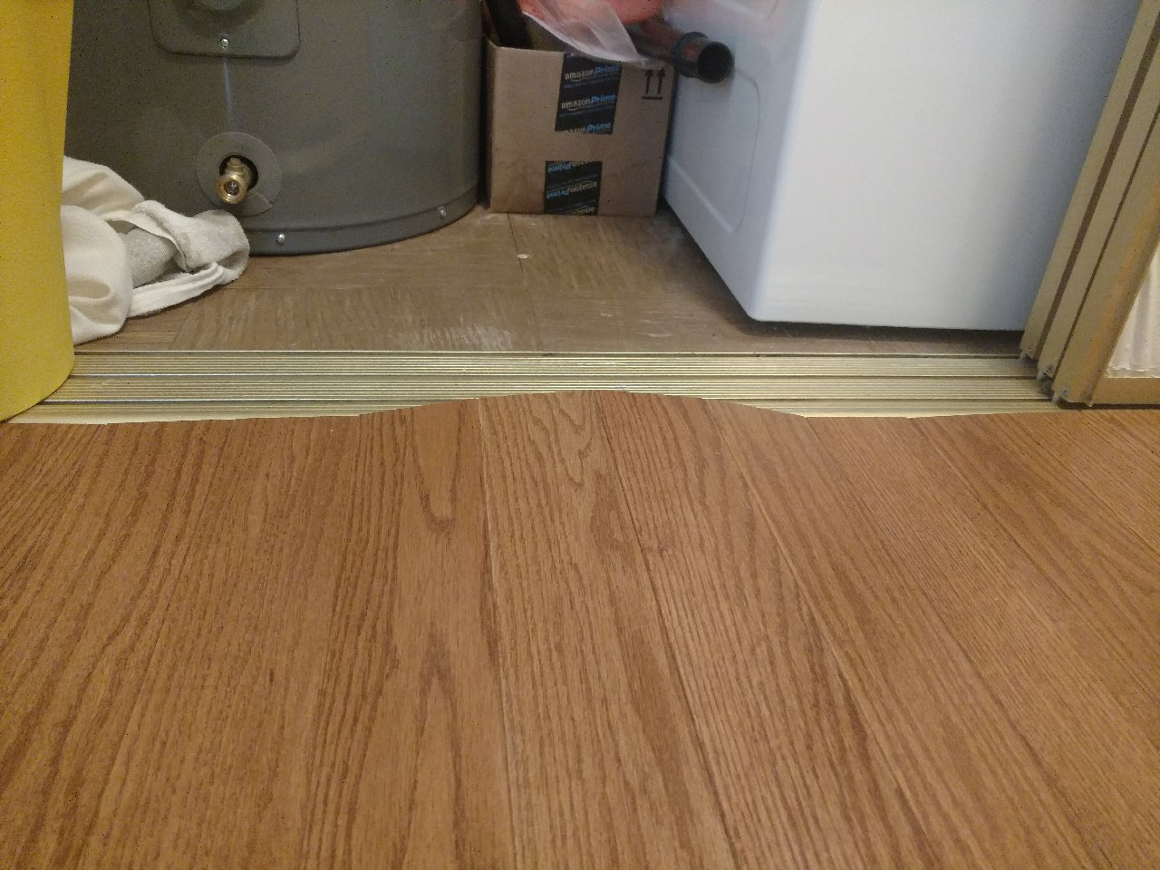 wood floor buckling dishwasher